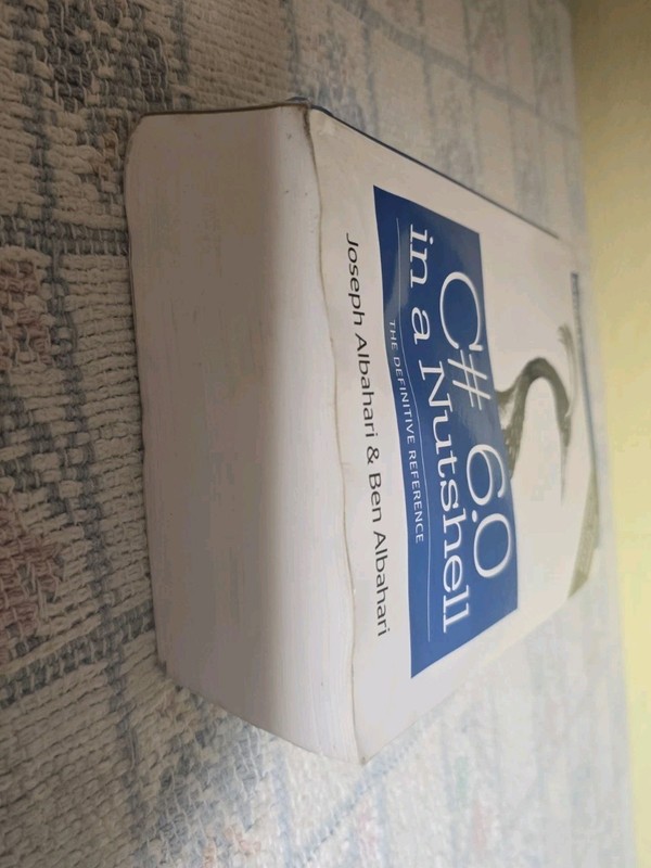 C# 6. 0 in a Nutshell : The Definitive Reference by Joseph Albahari and Ben... gallery